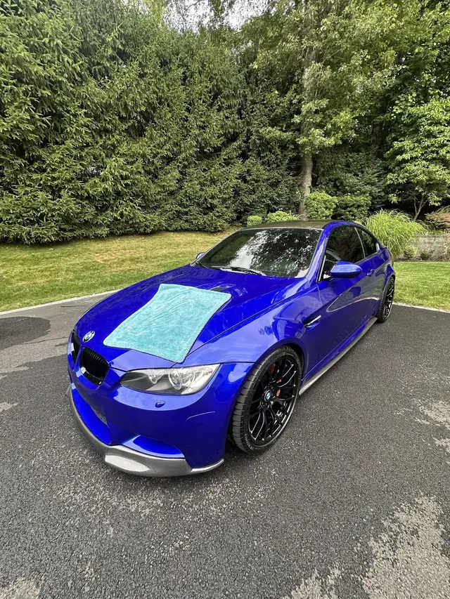 Blue BMW M3 after a wash