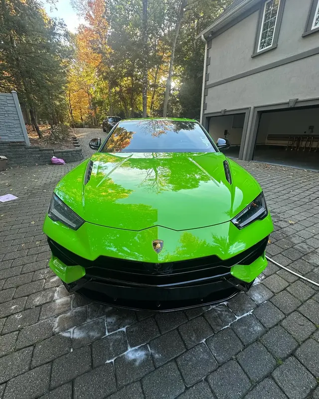 Lime green Lamborghini Urus after a detail